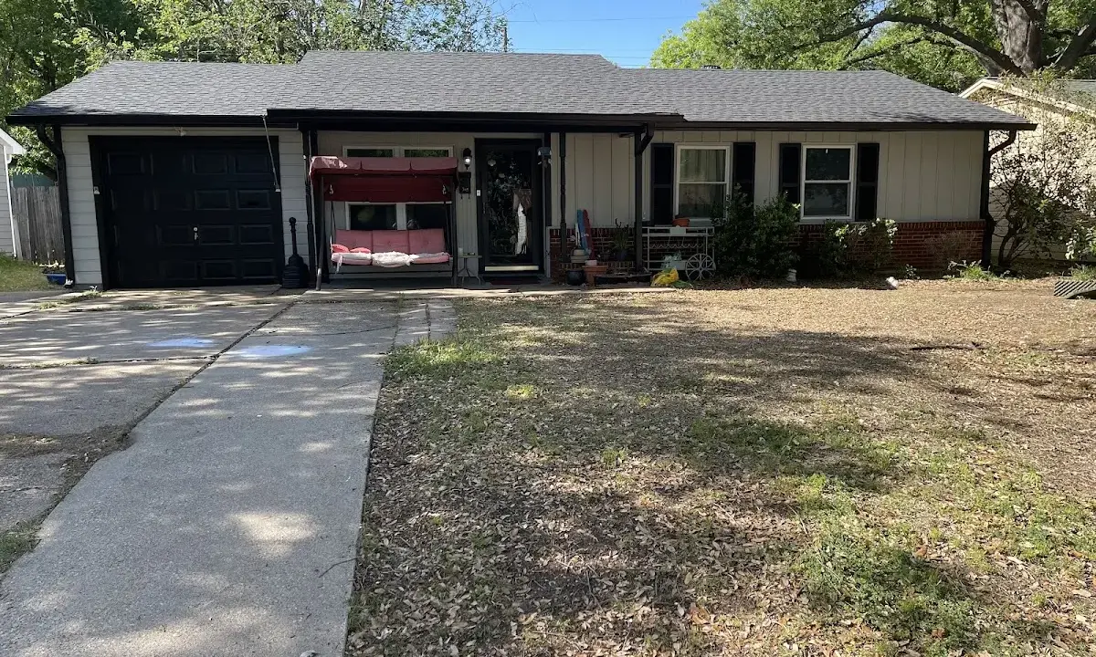 Asphalt Shingle Roof Repair crew at work on a residential roof in Houston